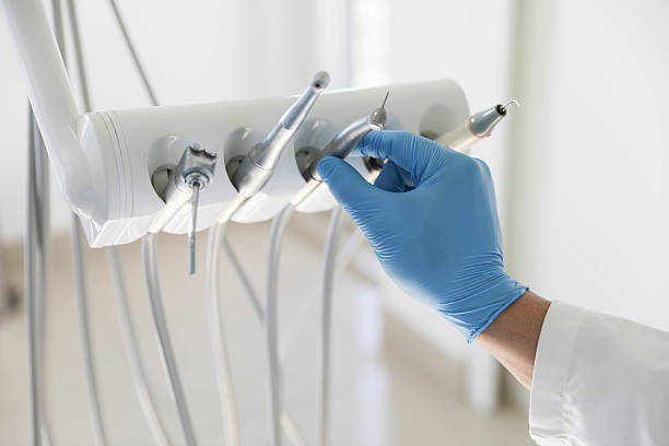 Professional Tooth Extraction technician working in Hitchcock, TX